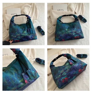 Detail view of Monet Water Lilies print bucket bag with woven handles and art tags