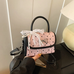 Pink heart-print crossbody bag with pearl charms and lace bow decoration