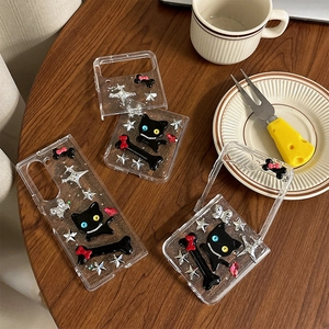 Y2K style star and cat phone case for Samsung Z Flip6 on a cozy cafe table setup