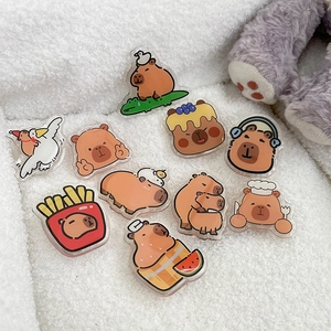 Cute cartoon Capybara acrylic phone grip variety set on soft white plush background