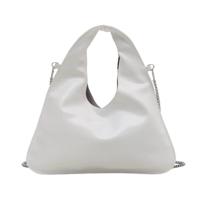 Minimalist white leather handbag with curved bottom and elegant metal chain strap