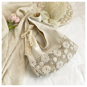 Detailed view of exquisite floral crochet work on a beige Korean style canvas bag