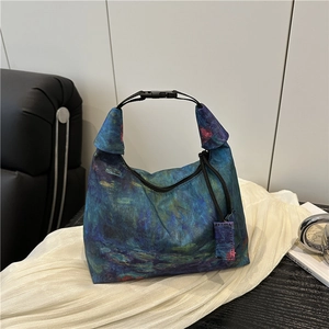 Monet style floral embroidery bucket bag with water lily print and buckle handle