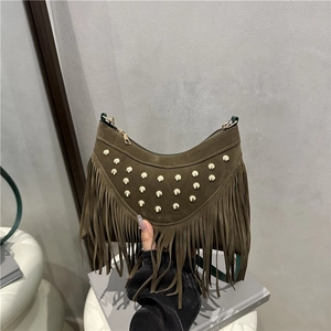 Retro faux suede shoulder bag with tassels and gold studs in deep olive green
