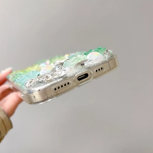 Detailed bottom view of luxury Samsung case with green resin roses and pearls