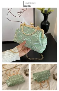 Detail of green sequin embroidery and lace texture on vintage evening clutch bag