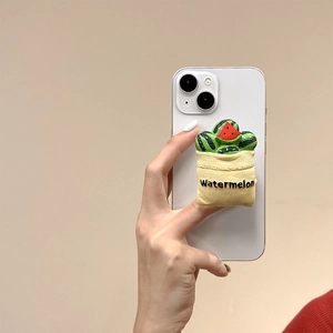 Detailed view of 3D watermelon bag phone grip holder with telescopic air cushion stand