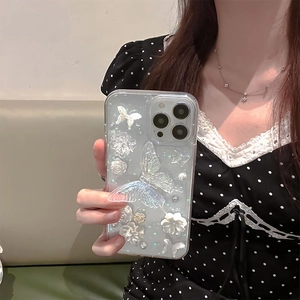 Elegant iridescent butterfly and pearl clear phone case for iPhone featuring floral sequins