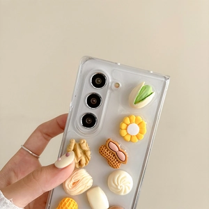 Detail shot of clear Samsung Z Flip 6 case with 3D pistachio and vegetable resin charms