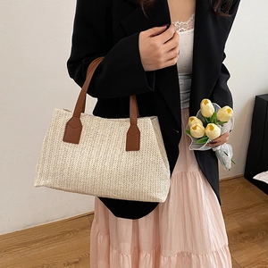 Elegant Korean style straw woven tote bag with brown leather handles and flowers