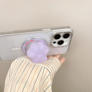 Close-up of a purple cat paw magnetic phone grip with Good Luck text on white case