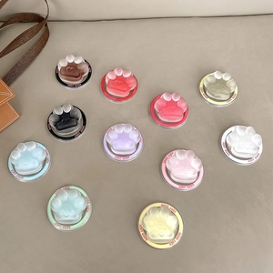 Cute transparent cat paw phone socket stands with heart detail and Good Luck text