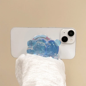 Support de téléphone ours bleu aurore iridescent avec finition laser sur smartphone blanc
