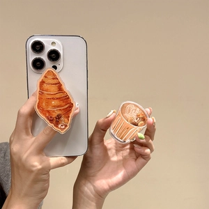 Cute acrylic expandable phone grip with croissant and latte coffee cup illustration