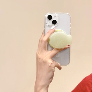 Vue détaillée d'un support magnétique en forme de poisson vert menthe sur une coque