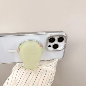 Détail macro d'un support de téléphone magnétique vert clair en forme de poisson Luck