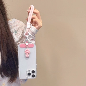 Detail of pink fishbone pendant with love heart on thick braided phone strap and clear case