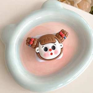 Detail of cute cartoon girl phone grip with retractable mirror and purple base