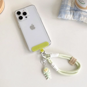 Macro shot of green braided phone lanyard with fishbone charm and LOVE heart detail