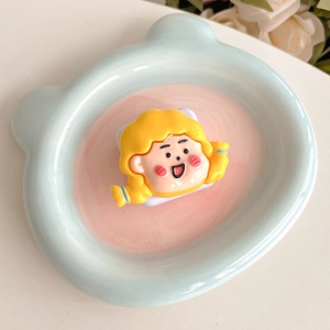 Cute cartoon girl resin phone socket placed in a pastel bear-shaped ceramic tray