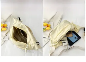 Detail view of large capacity canvas chest bag interior with multiple storage compartments