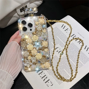 Luxus-Parfümflaschen-Handyhülle mit Strass und Blumenkette für iPhone 16 Pro