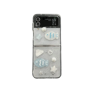 Custodia glitter per Galaxy Z Flip con ciondoli 3D a forma di conchiglie e stelle