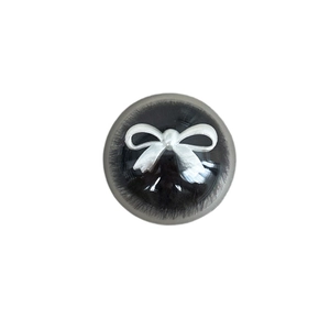 Magnetic pearl bow phone socket grip with black glitter finish and spherical design