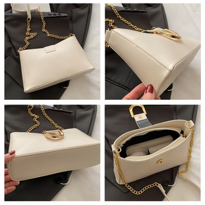 Detailed views of cream leather baguette bag with gold chain and interior storage capacity