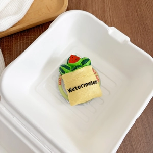 Gedetailleerd overzicht van een creatieve 3D-watermeloenzakvormige telefoonhouder