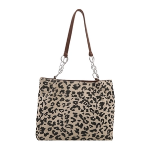 Large leopard print corduroy tote bag with brown leather handles and metal chain links