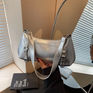 Metallic silver pleated underarm bag with double straps and minimalist baguette design