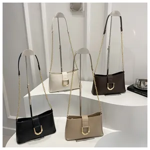 Collection of four elegant underarm bags in black, beige, brown, and khaki with U-shaped buckles