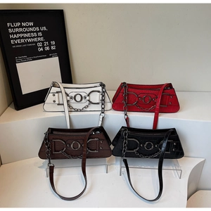 Set of four croc-embossed underarm bags in white red brown and black with chain detail
