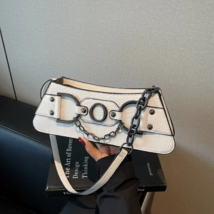 White crocodile pattern baguette bag with black metal hardware and chain handle