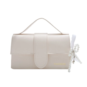 Chic beige crossbody square bag with pearl bow charm and fashion gold lettering