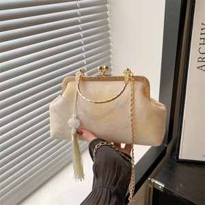 Retro beige floral jacquard frame bag with golden handle and long tassel charm