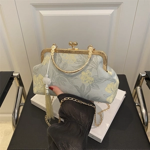 Vintage light blue floral handbag with gold metal frame and pearl tassel detail