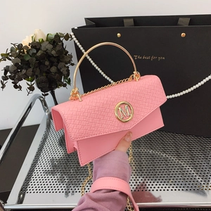 Pink woven texture flap handbag with gold M logo and circular metallic top handle