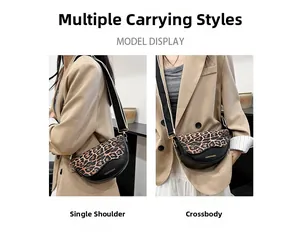Leopard print saddle bag with wide striped strap shown in shoulder and crossbody styles