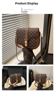 Detail of coffee saddle bag with geometric pattern and golden twist lock closure