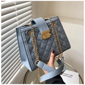 Elegant light blue quilted chain shoulder bag with gold metal clasp and PU leather texture