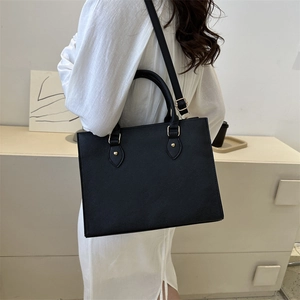 Minimalist black tote business handbag with adjustable strap for professional women