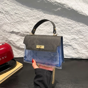 Retro Kelly bag with blue transparent PVC geometric body and grey leather flap in 2025 style