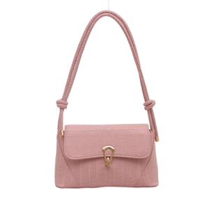 Pink crocodile-embossed rectangular shoulder bag with golden horseshoe buckle and knot detail
