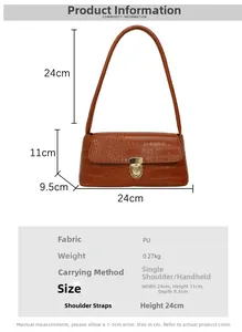 Detail of caramel crocodile pattern leather bag with metallic buckle closure
