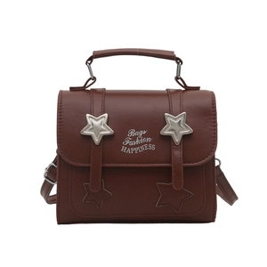Star pattern dark brown leather crossbody bag with silver star studs and top handle