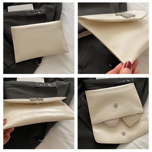 Detailed views of cream envelope clutch bag with metal logo and magnetic closure