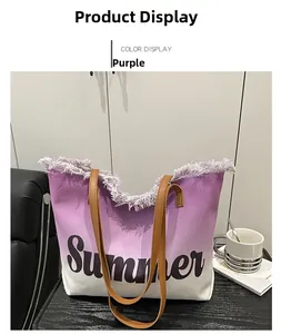 Detail of purple gradient canvas tote bag with fringe edge and Summer letter print