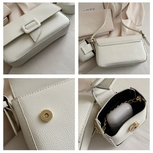 Detail of white lychee grain PU leather bag with magnetic buckle and mini earphone pouch